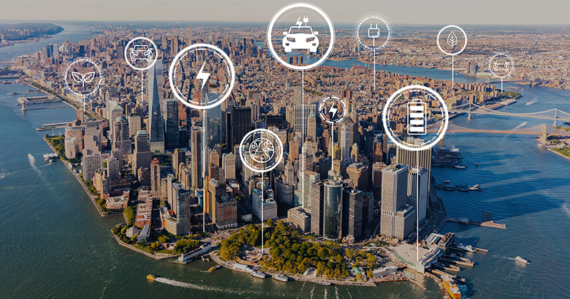 EV with aerial view of Manhattan NY skyline_AdobeStock_275475343.jpeg